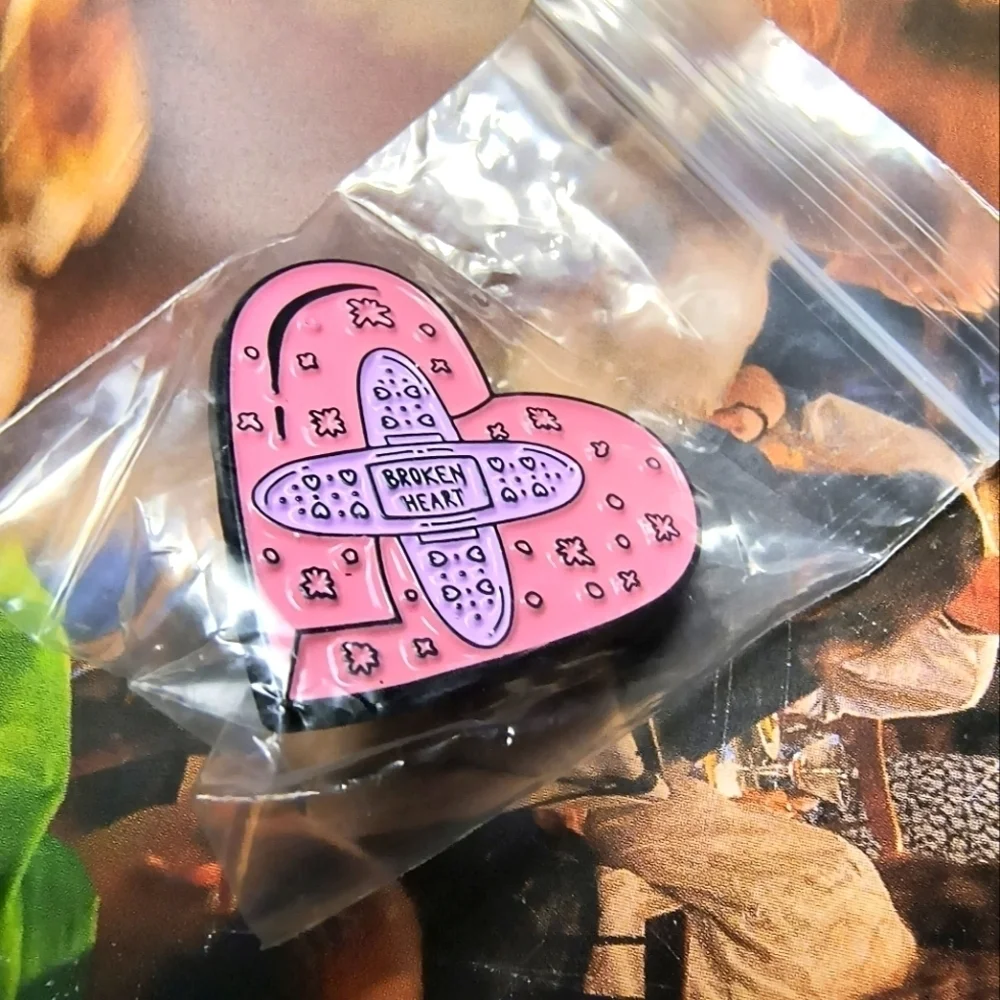 Pink heart with bandaids Broken Heart enamel pin backpack hat clothes bag cap